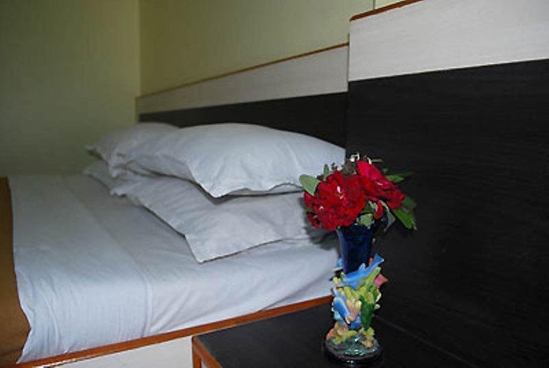 Sai Ganesh Hotel Shirdi Værelse billede